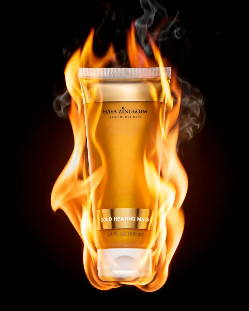Gold mask jar wrapped in flame and smoke