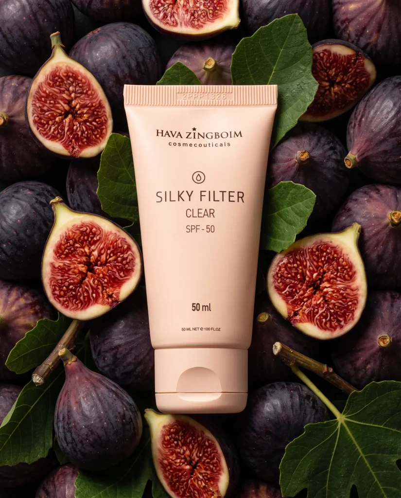 Skincare tube on a bed of whole and halved figs