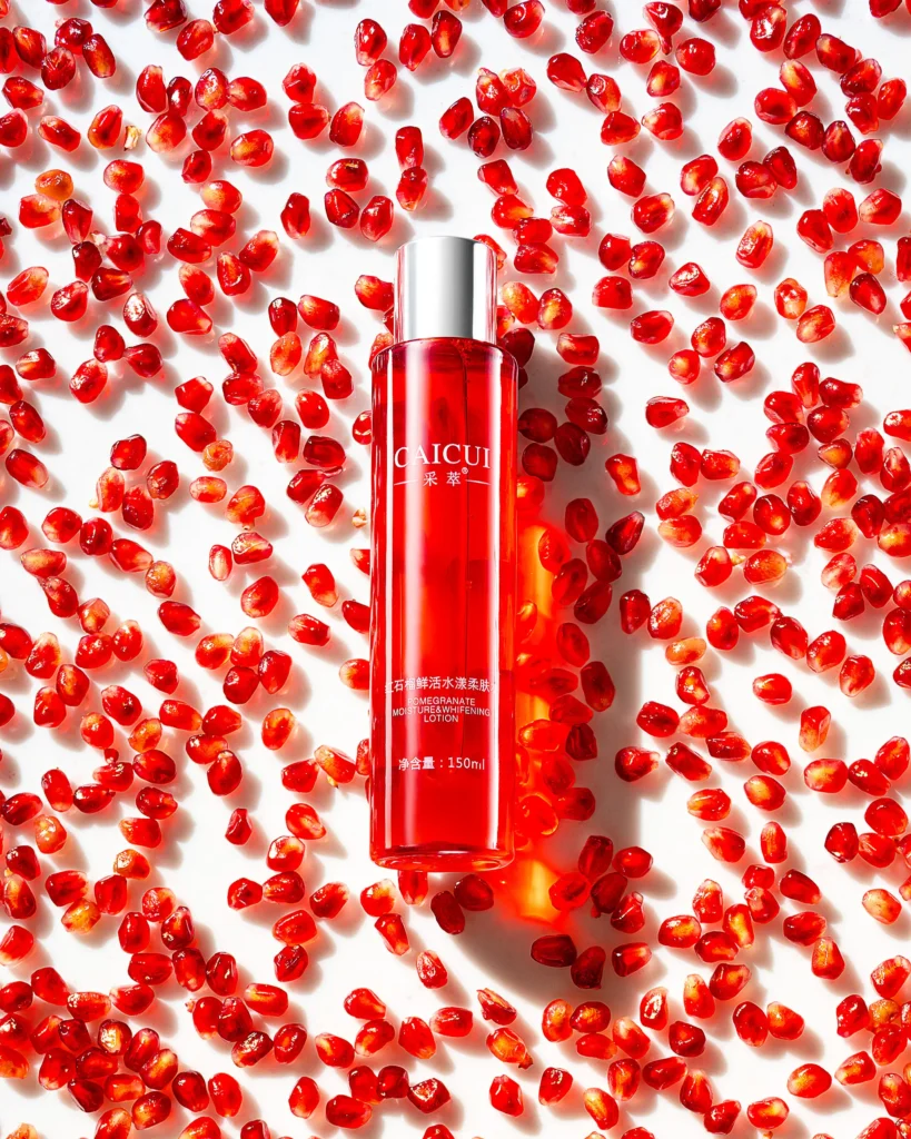 Rose-toned skincare tube resting on a bed of halved figs