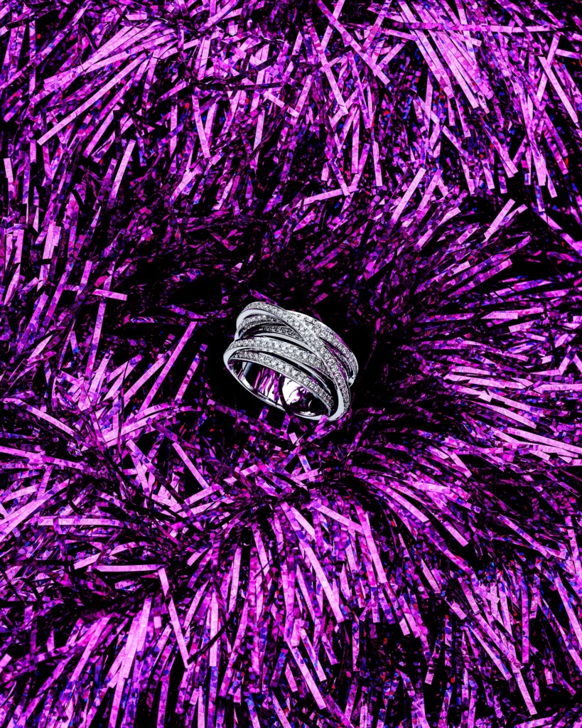 Diamond band ring at the centre of purple foil strands